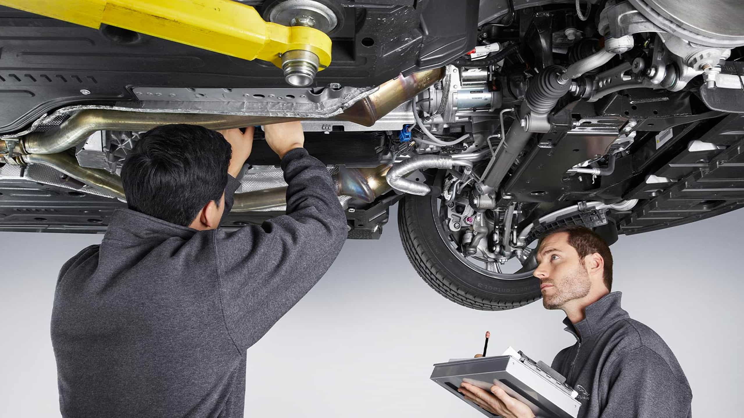 Jaguar workshop a mans are doing examination